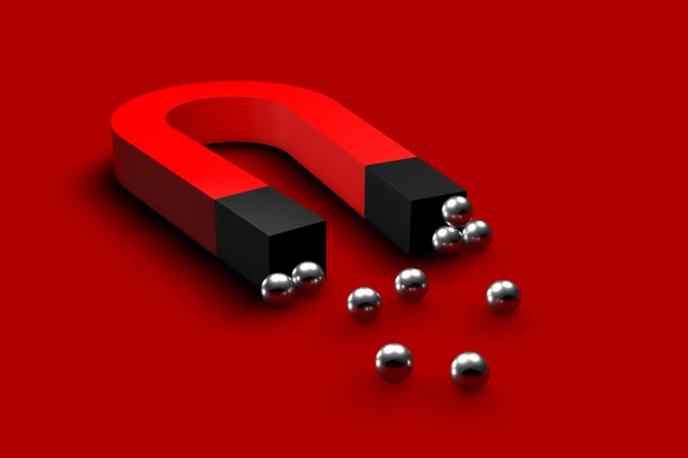 3d illustration magnet red background with steel balls 250425054